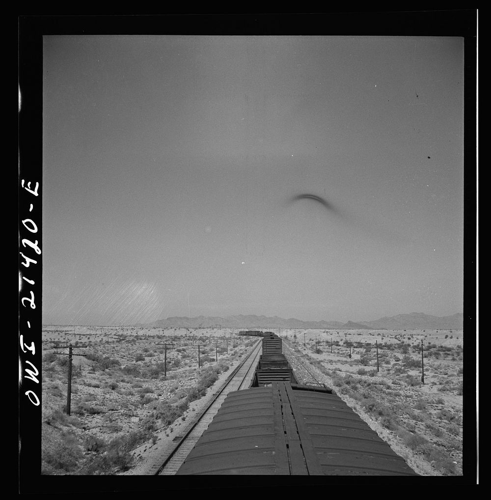 [Untitled photo, possibly related to: The Atchison, Topeka, and Santa Fe Railroad train between Needles and Barstow…
