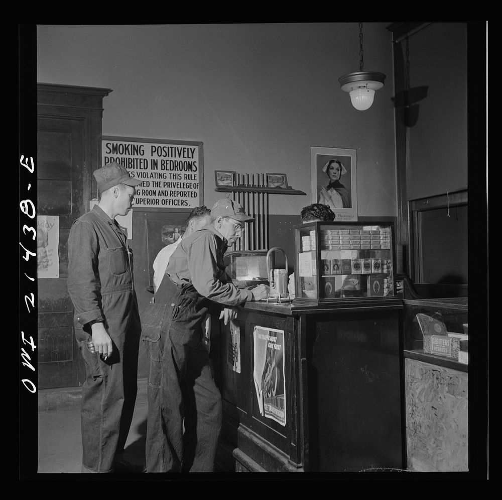 Barstow, California. Brakeman, Charles M. Dawes, registering at the reading room in the Atchison, Topeka, and Santa Fe…