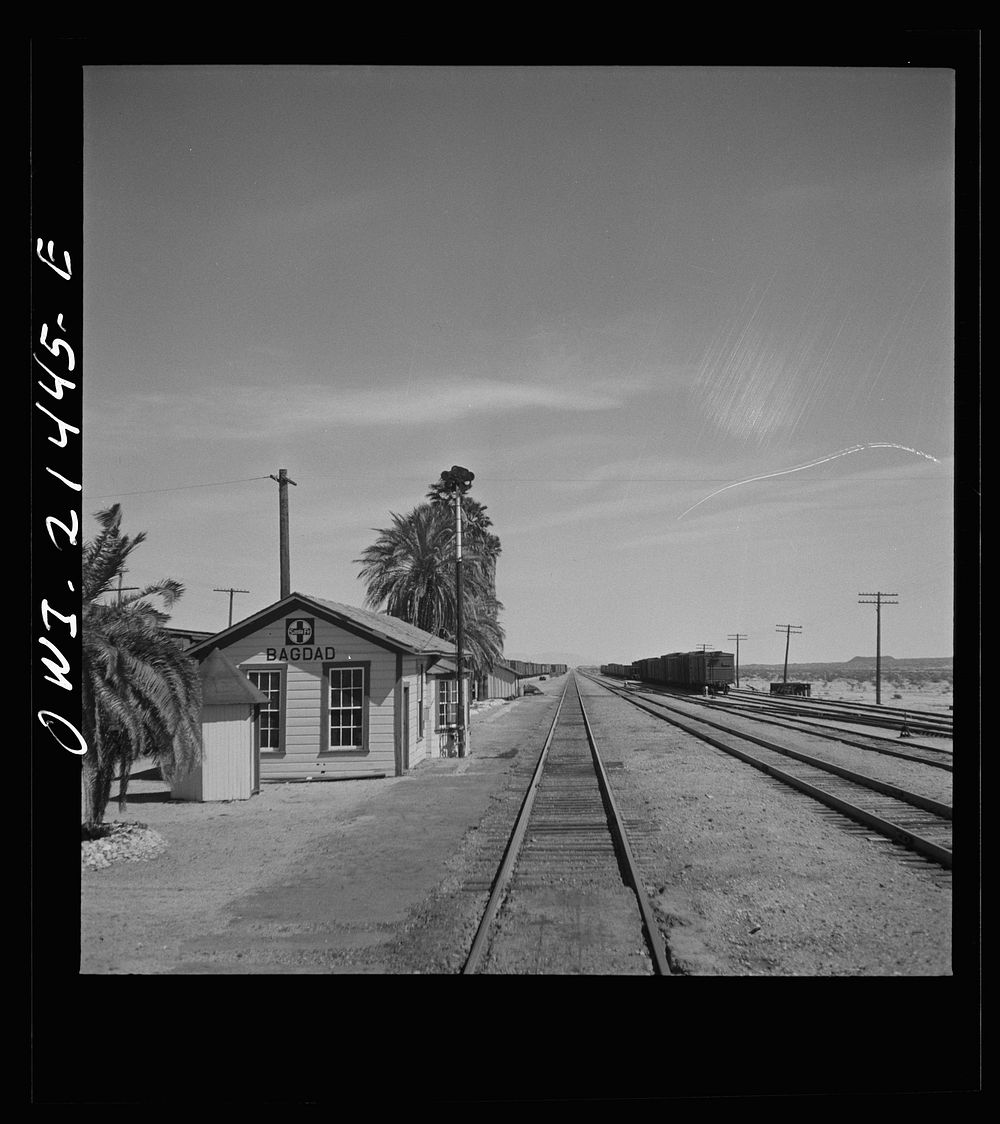 Bagdad, California. Going through the station on the Atchison, Topeka and Santa Fe Railroad between Needles and Barstow…
