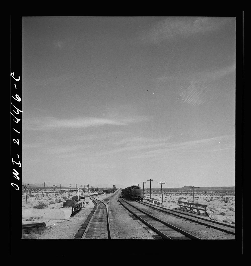Bagdad, California. Leaving the station on the Atchison, Topeka and Santa Fe Railroad between Needles and Barstow…