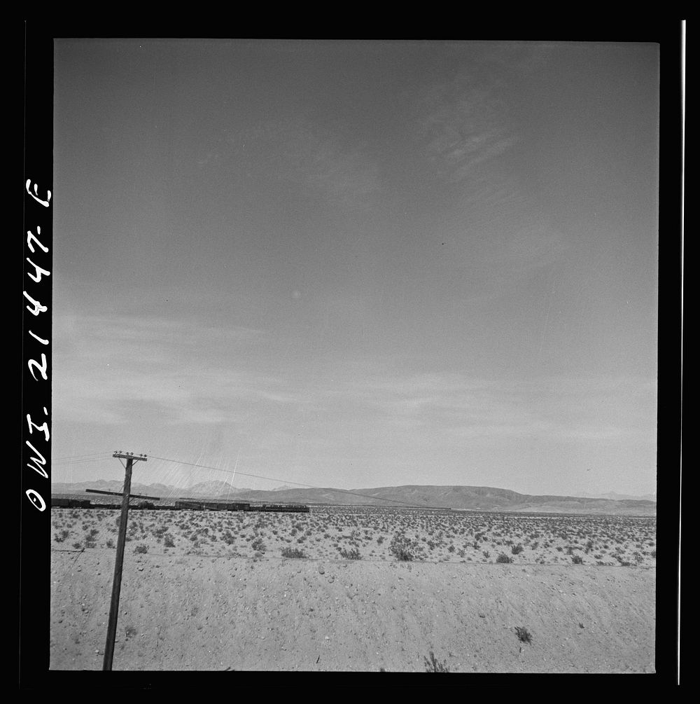 [Untitled photo, possibly related to: Klondike (vicinity), California. Going around a curve on the Atchison, Topeka and…