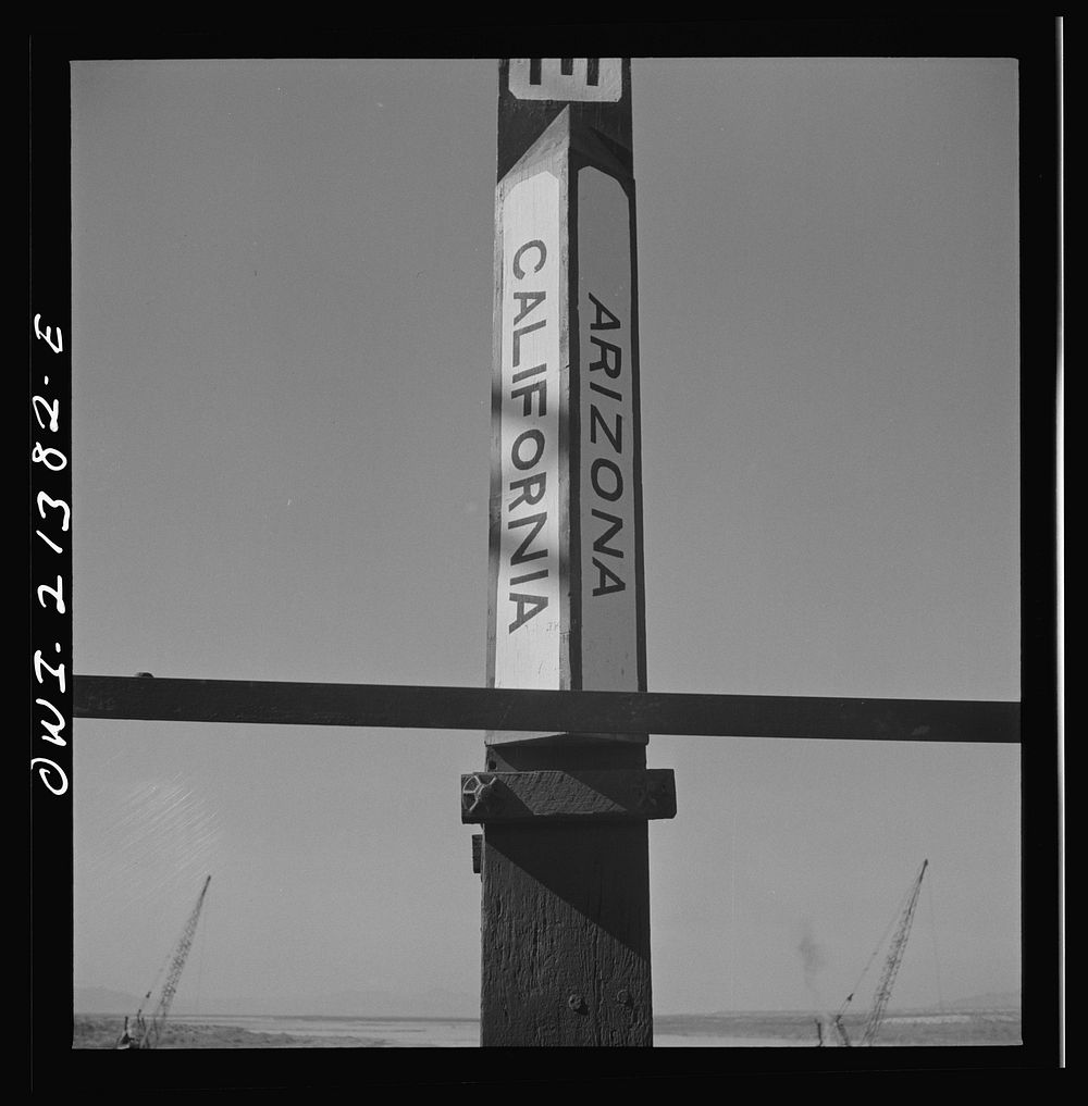 Topock (vicinity), Arizona. A state line marker on a bridge over the Colorado River on the Atchison, Topeka and Santa Fe…