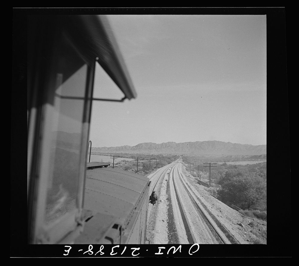 Needles (vicinity), California. Coming across a newly-laid road bed on the Atchison, Topeka and Santa Fe Railroad between…