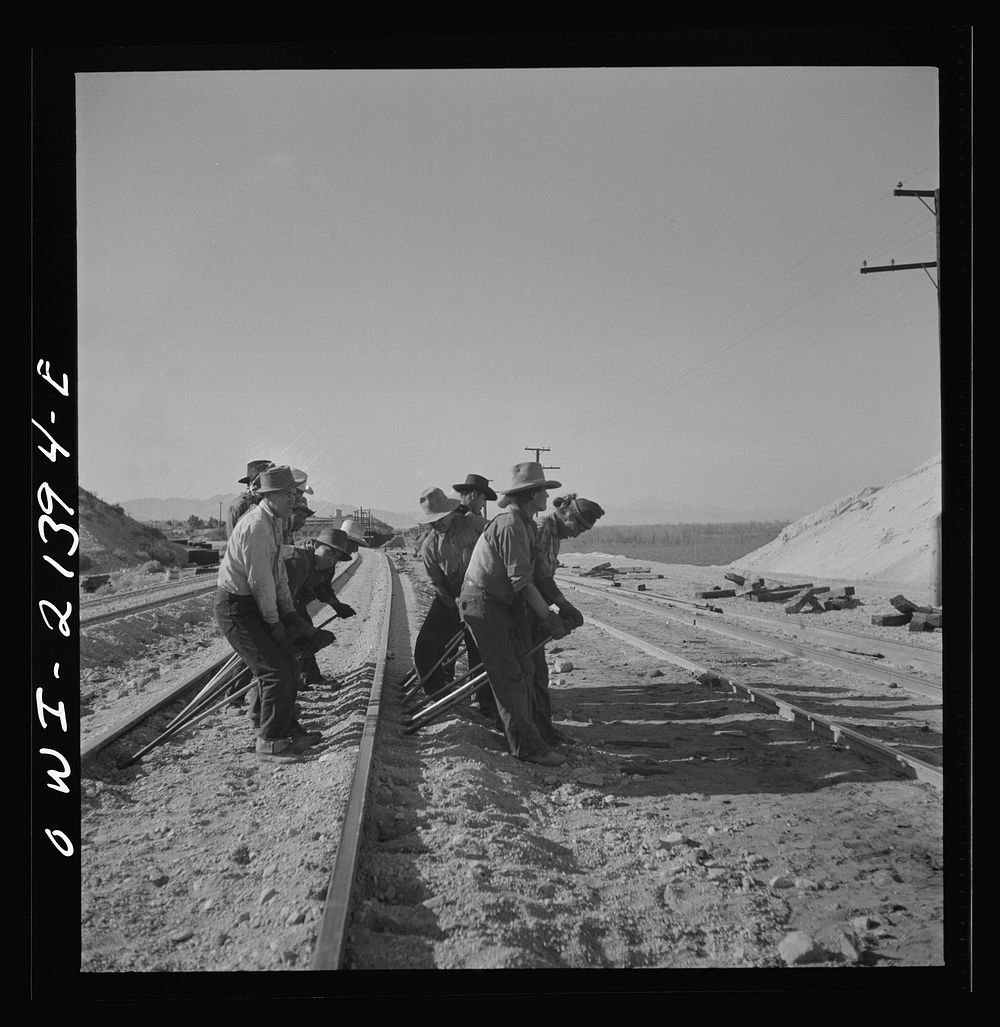 [Untitled photo, possibly related to: Needles, California. An Indian section gang at work on the tracks in the Atchison…