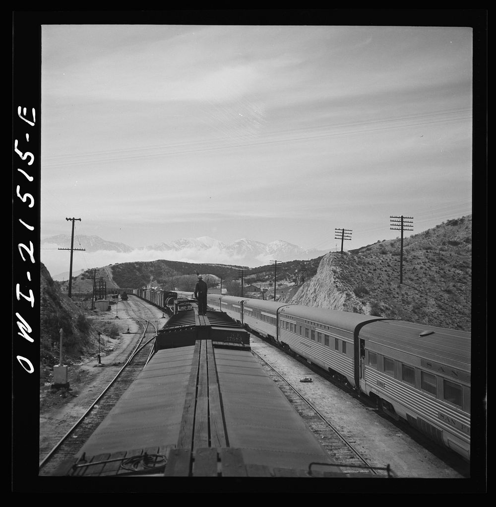 Summit (vicinity), California. Passing an eastbound passenger train, the Chief, while coming down the mountain on the…