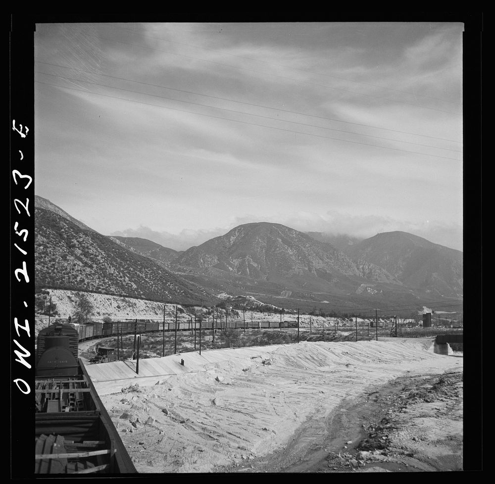 Summit (vicinity), California. Going down the mountains on the Atchison, Topeka, and Santa Fe Railroad between Barstow and…