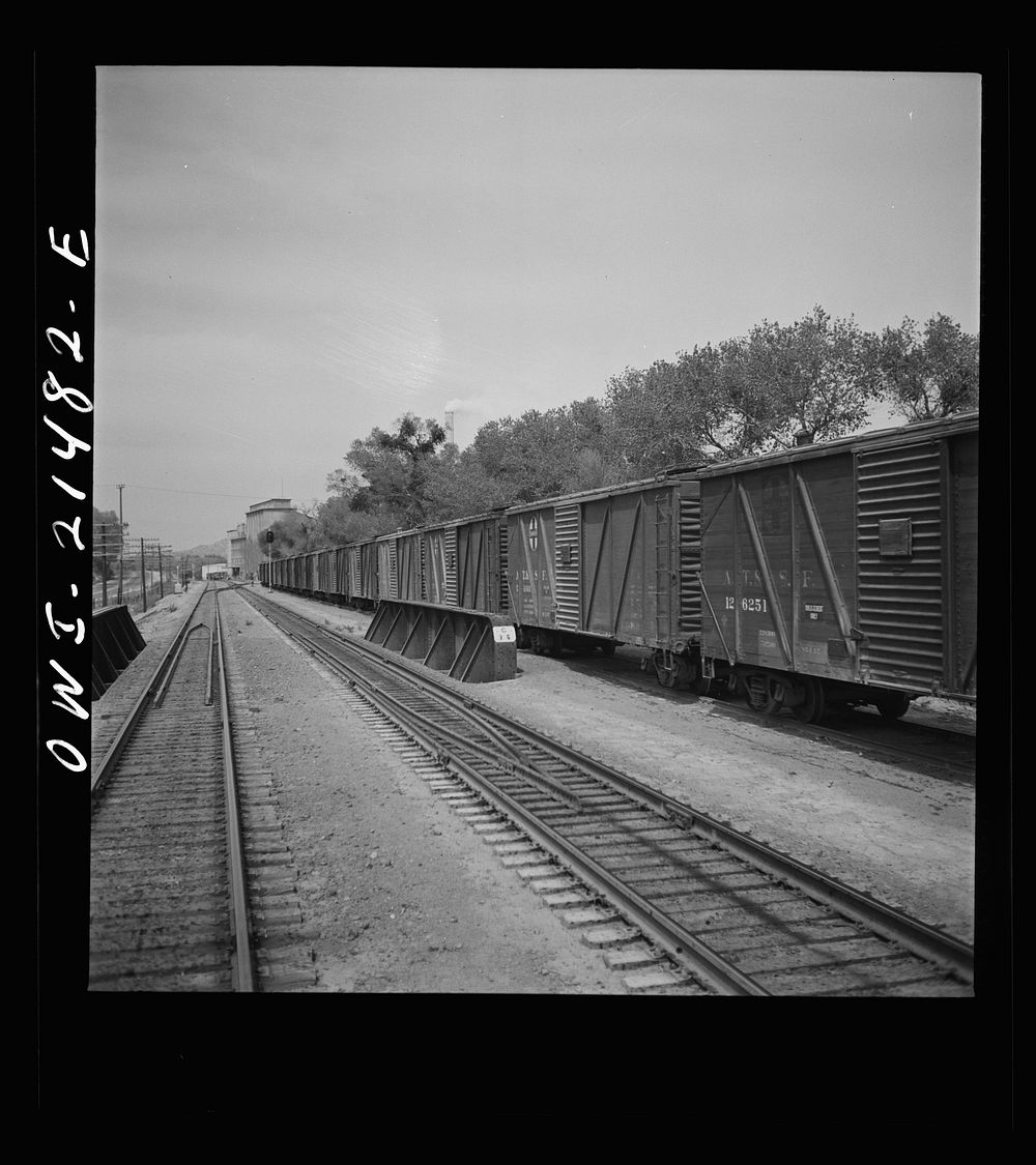 Victorville, California. Going through a town on the Atchison, Topeka and Santa Fe Railroad between Barstow and San…