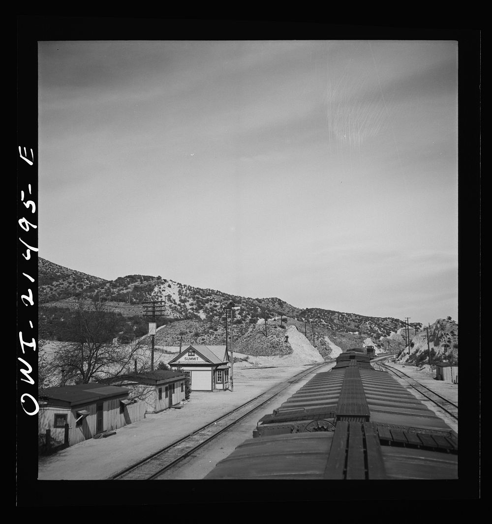 Summit, California. Going through town on the Atchison, Topeka, and Santa Fe Railroad between Barstow and San Bernardino…