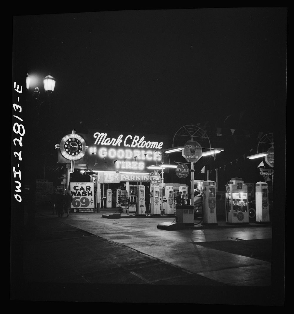 Hollywood, California. Gasoline filling station at night by Russell Lee