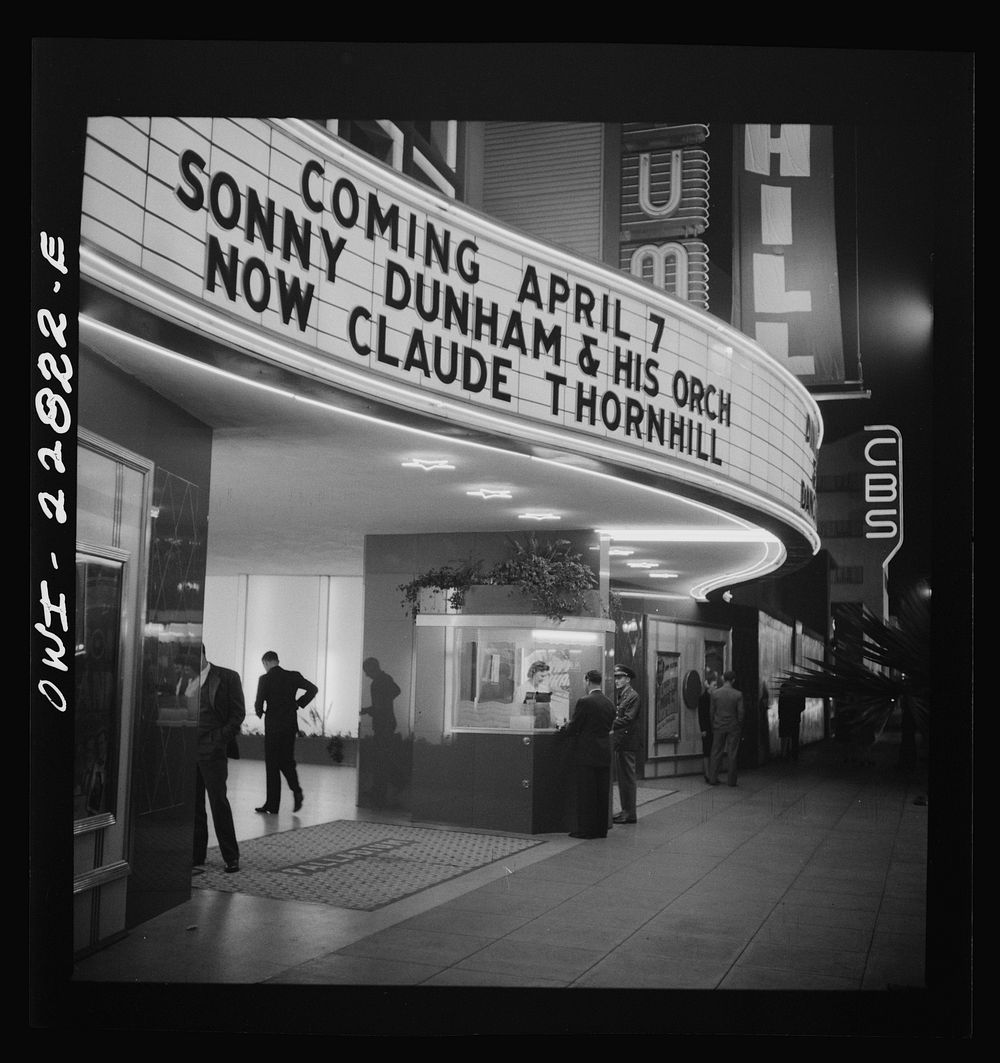 Hollywood, California. Sign and ticket window of a large dance palace by Russell Lee