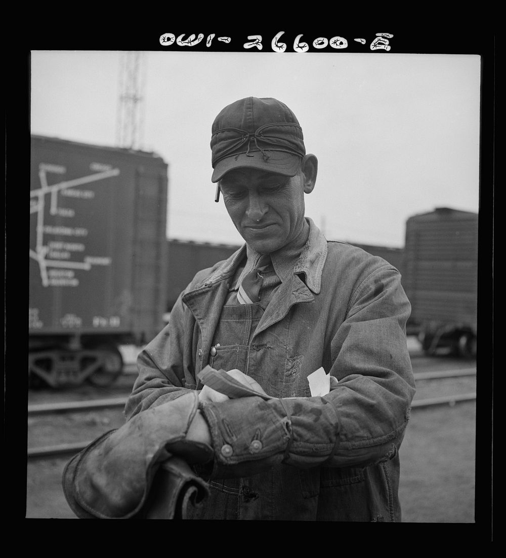 Cicero, Illinois. A switchman at the Clyde yard of the Chicago, Burlington and Quincy Railroad. Sourced from the Library of…