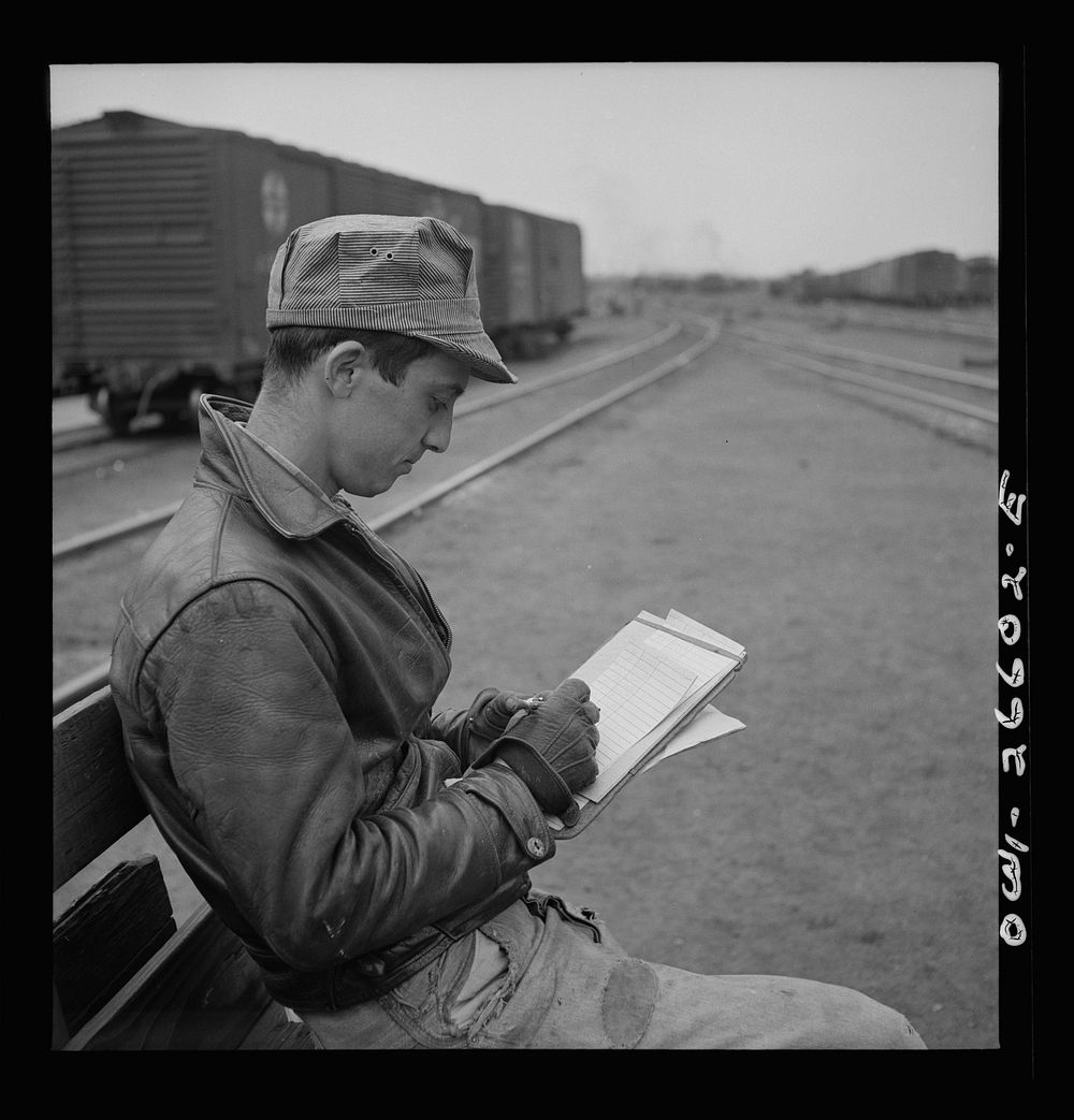 Cicero, Illinois. A yard clerk at the Clyde yard of the Chicago, Burlington and Quincy Railroad. Sourced from the Library of…