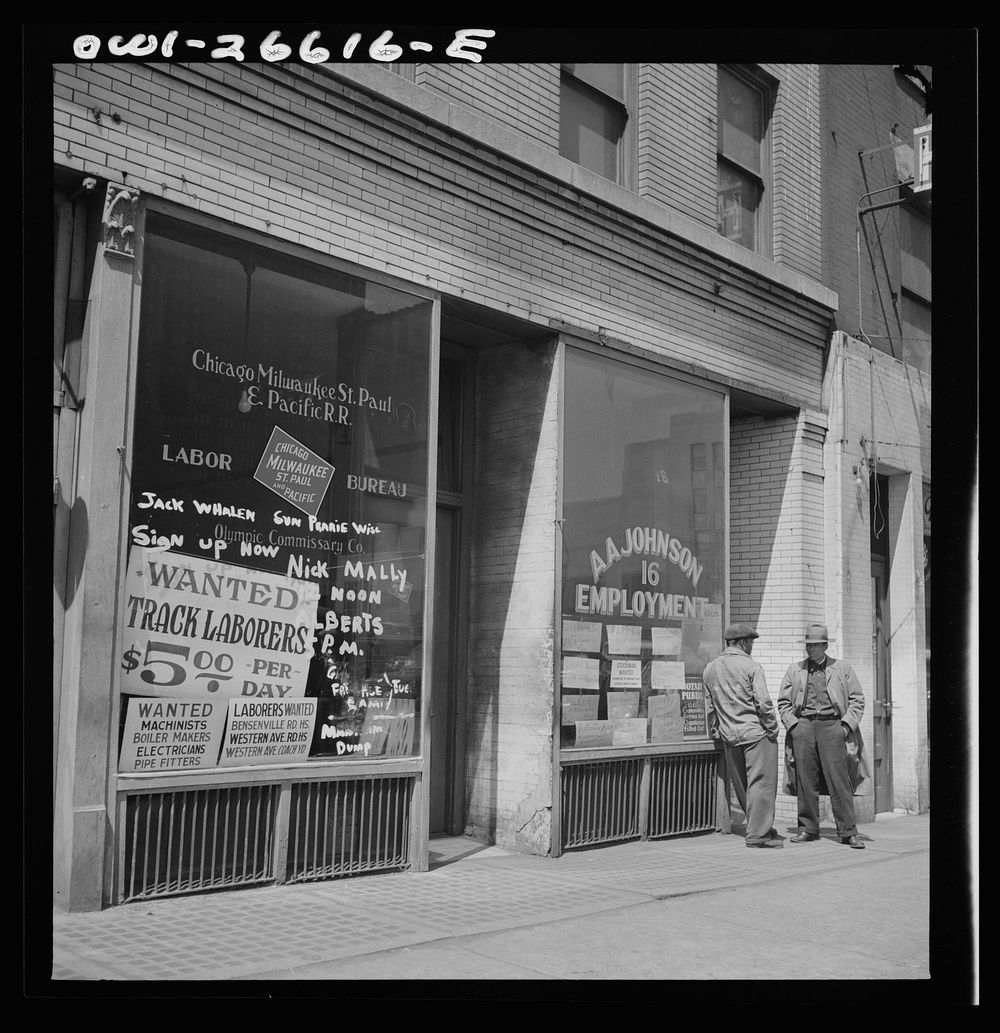 [Untitled photo, possibly related to: Chicago, Illinois. Railroad help wanted signs in window of an employment agency near…