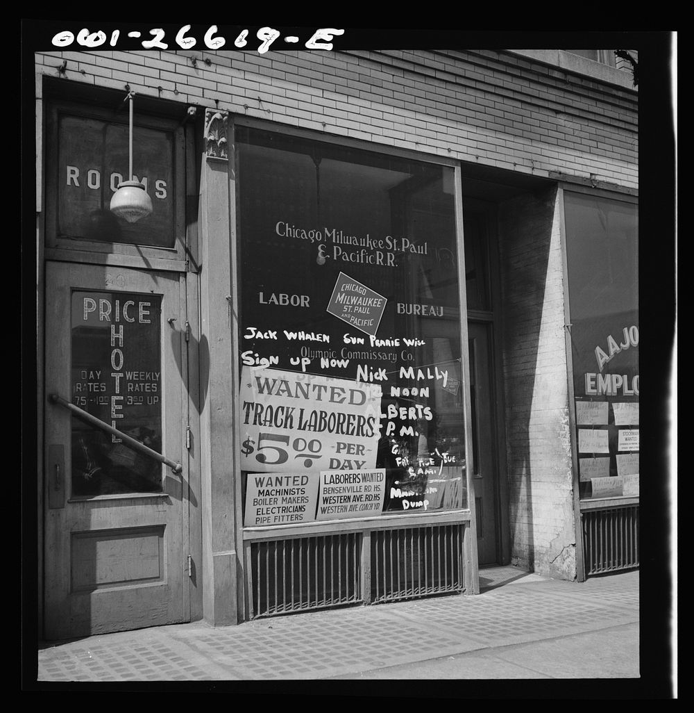 Chicago, Illinois. Railroad help wanted signs in windows of an employment agency near the Union Station. Sourced from the…