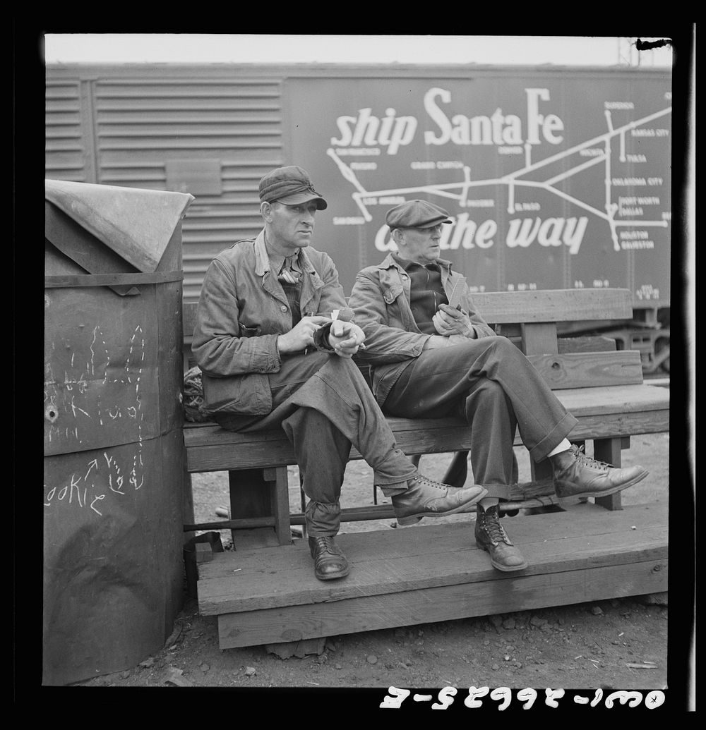 [Untitled photo, possibly related to: Cicero, Illinois. Switchmen discussing their switch lists at the Clyde yard of the…