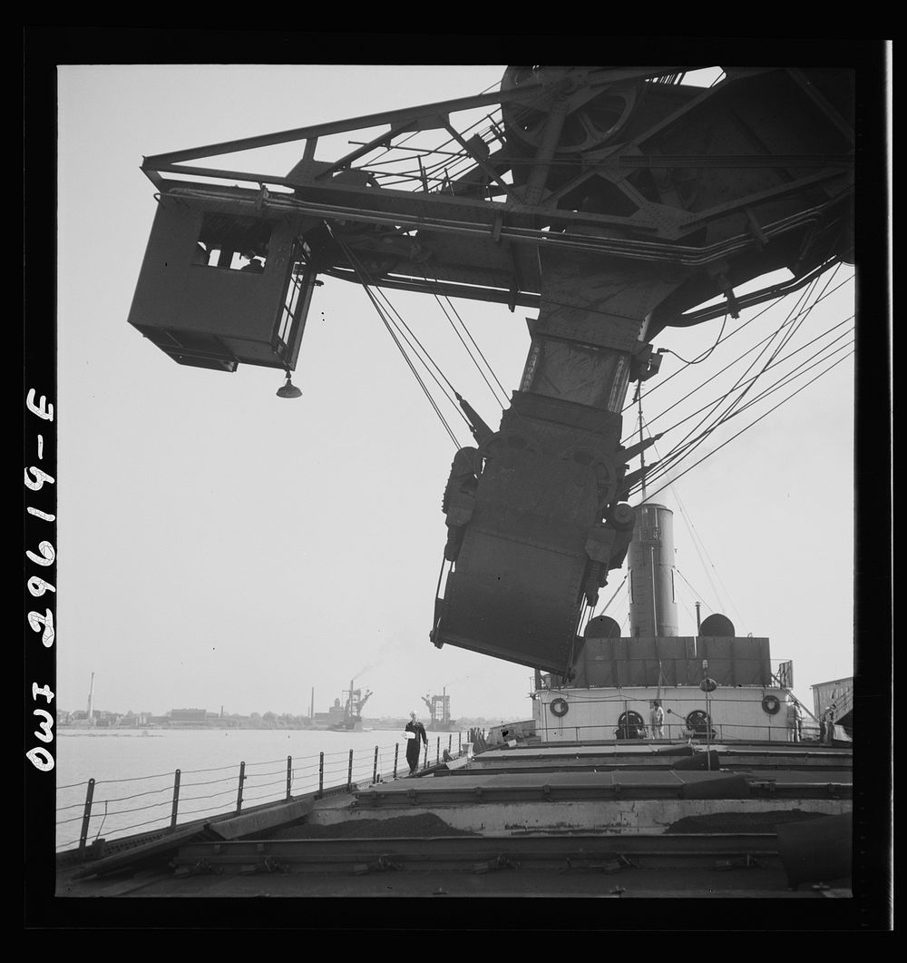 [Untitled photo, possibly related to: Sandusky, Ohio. Loading coal into a lake freighter at the Pennsylvania Railroad…