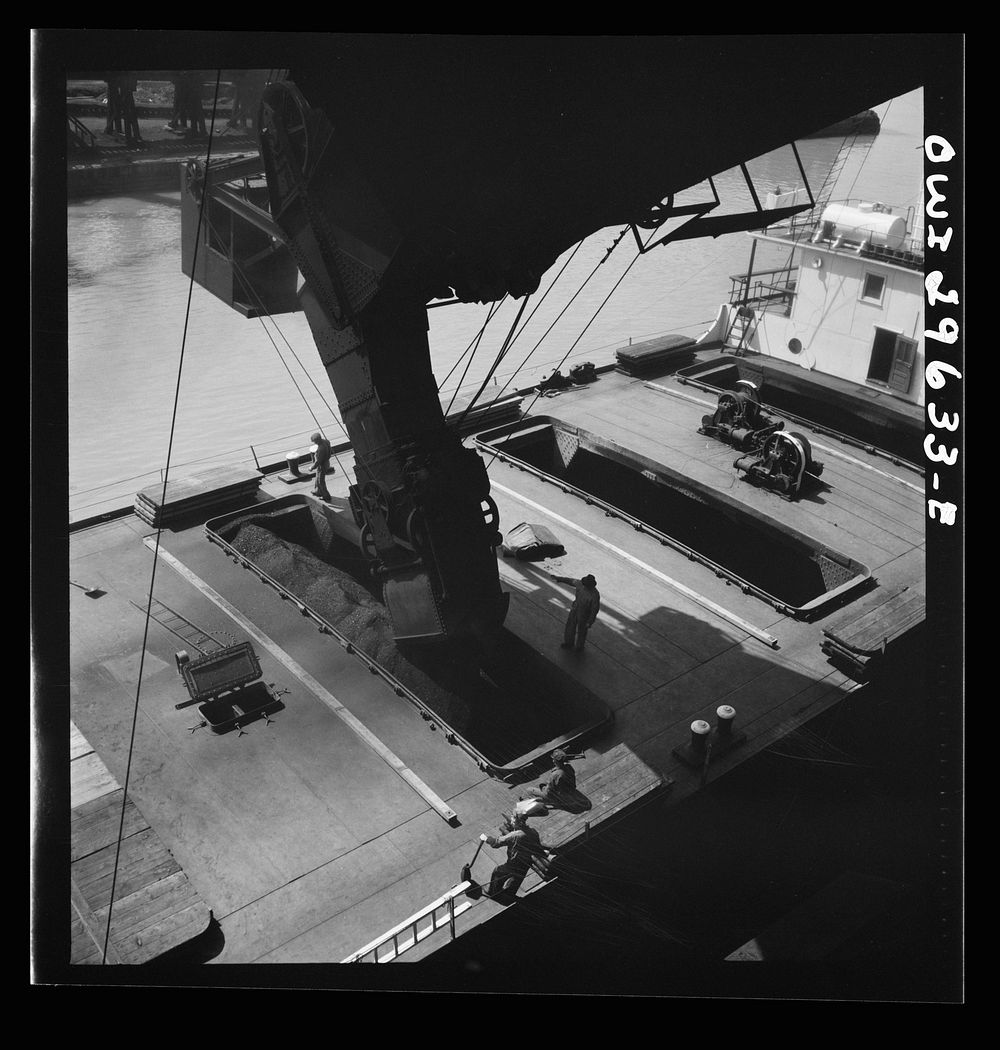 [Untitled photo, possibly related to: Sandusky, Ohio. Loading coal into a lake freighter at the Pennsylvania Railroad…