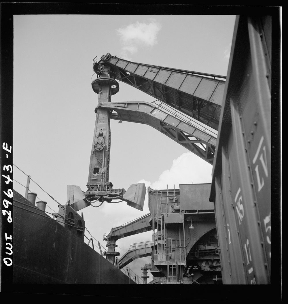 [Untitled photo, possibly related to: Cleveland, Ohio. Unloading iron ore from a lake freighter by means of Hewlett [i.e.…