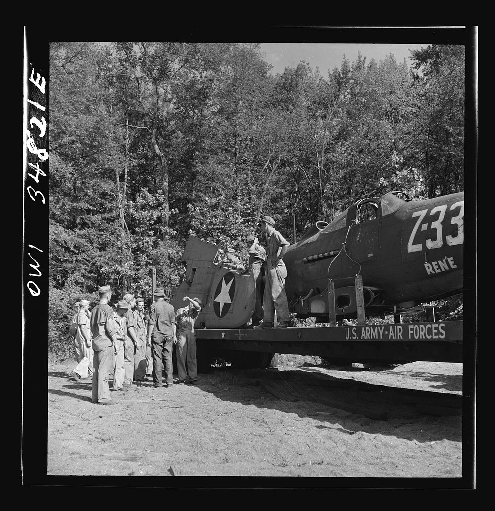 [Untitled photo, possibly related to: Warner Robins, Georgia. Air Service Command, Robins Field. Practicing picking up and…