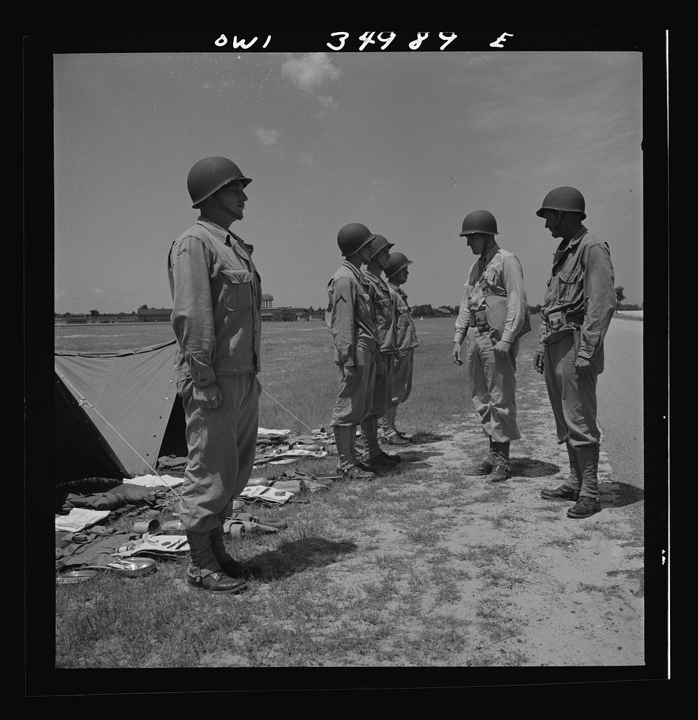 [Untitled photo, possibly related to: Daniel Field, Georgia. Air Service Command. Officer inspecting ranks]. Sourced from…