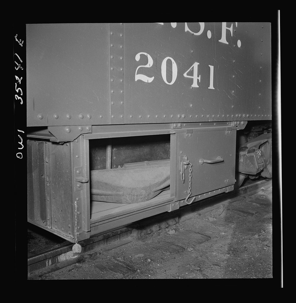 Clovis, New Mexico. Compartment in a new Atchison, Topeka and Santa Fe Railroad caboose containing a "frog" for rerailing a…