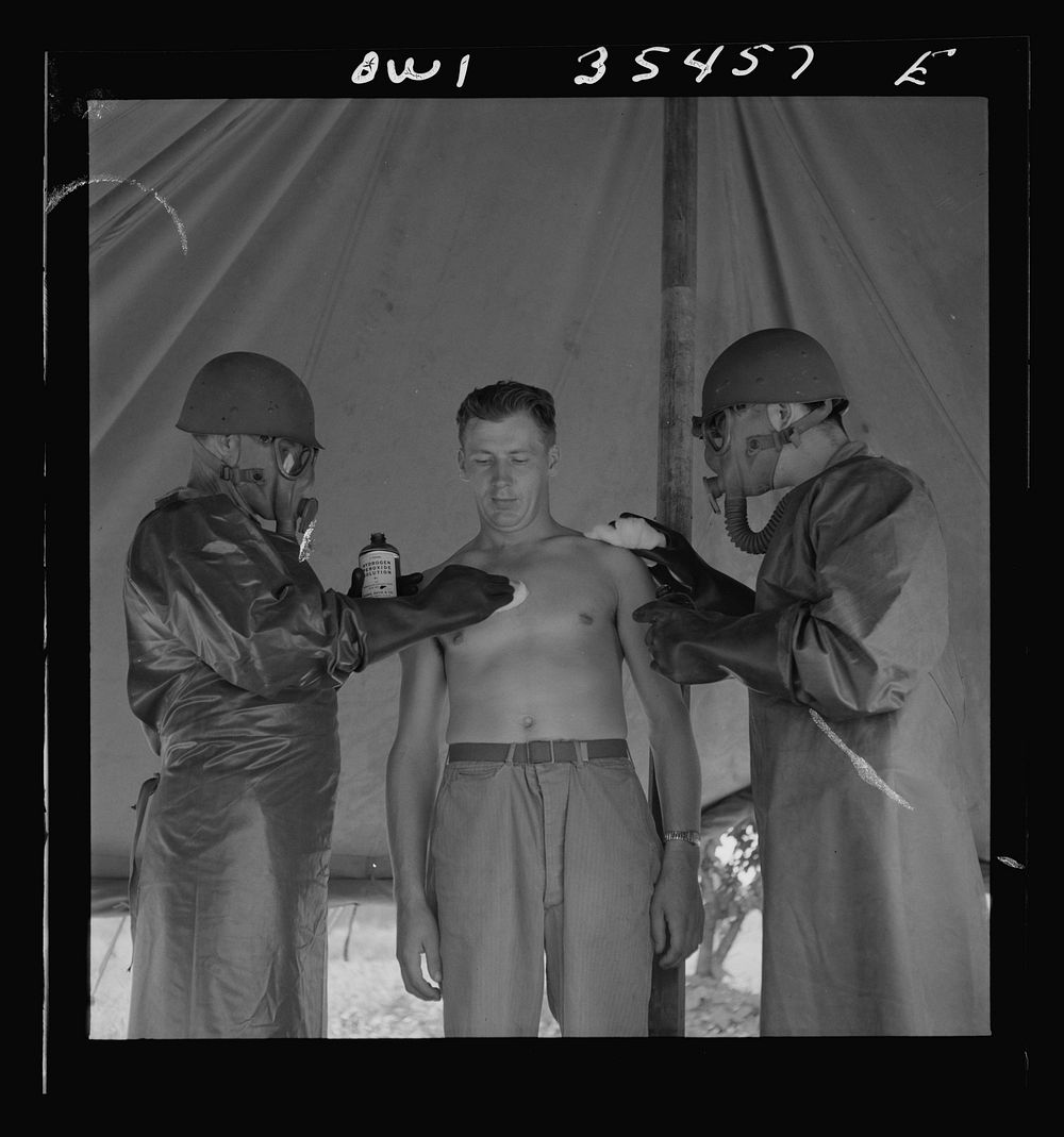 Greenville, South Carolina. Men of the medical unit of the 25th service group simulating the treatment of a gas casualty.…