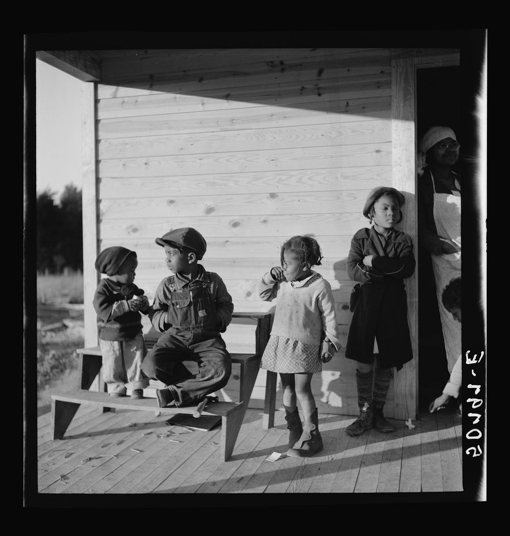 [Untitled photo, possibly related to: Children of rehabilitation client on front porch of new home near Raleigh, North…