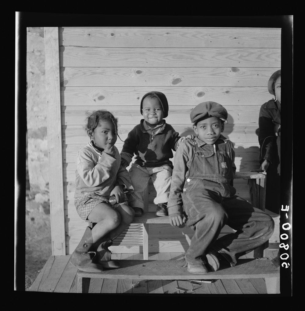 Children of rehabilitation client on front porch of new home near Raleigh, North Carolina. Sourced from the Library of…
