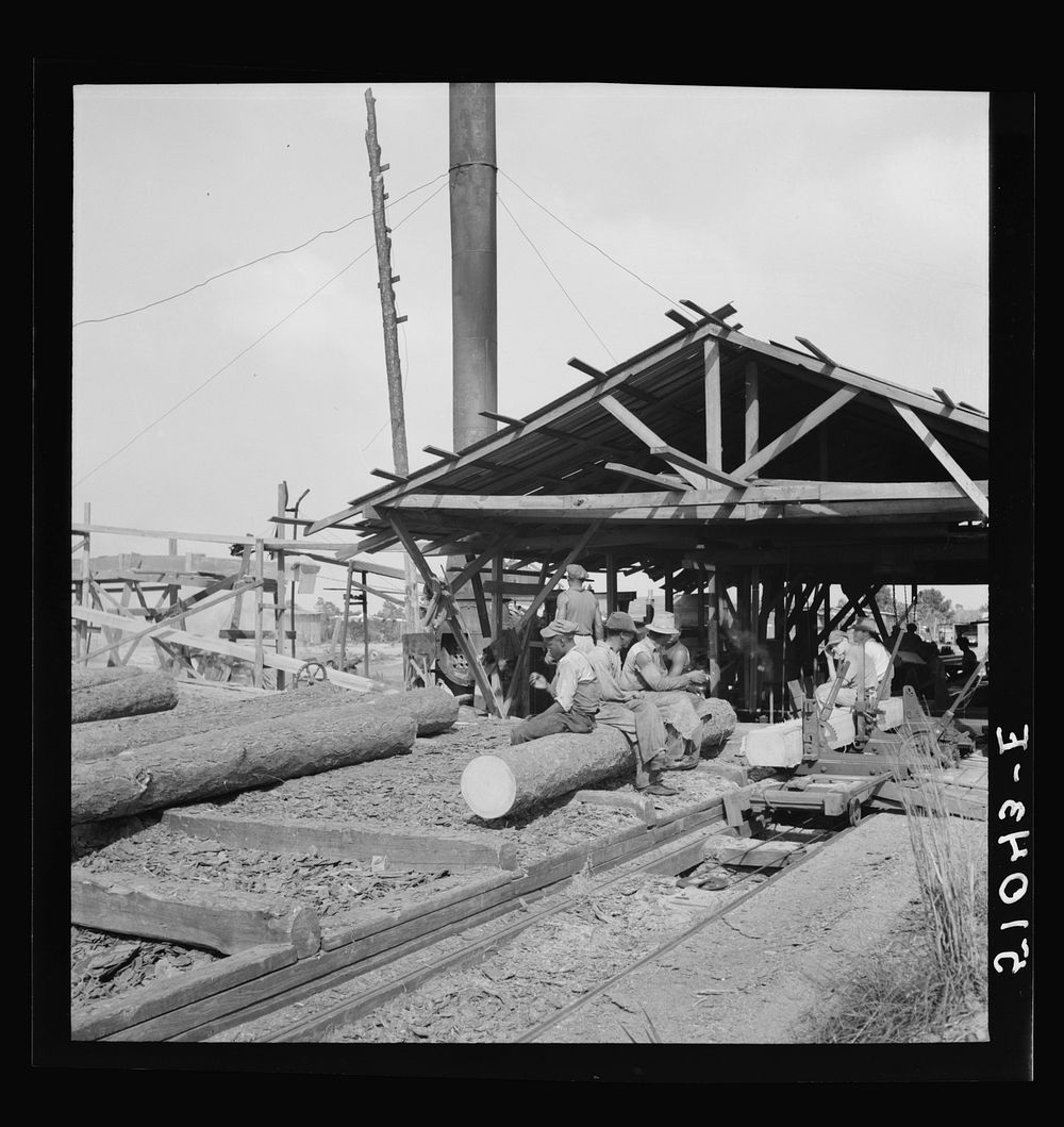 Waiting for motor to cool off.  Sawmill, Childs, Florida. Sourced from the Library of Congress.