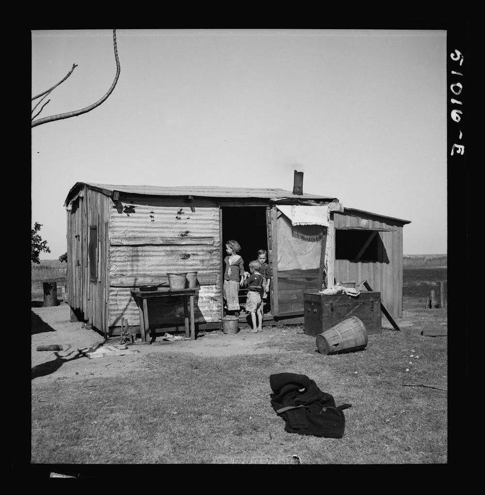 [Untitled photo, possibly related to: Migrant agricultural laborer's home. From North Carolina. They have six children, near…
