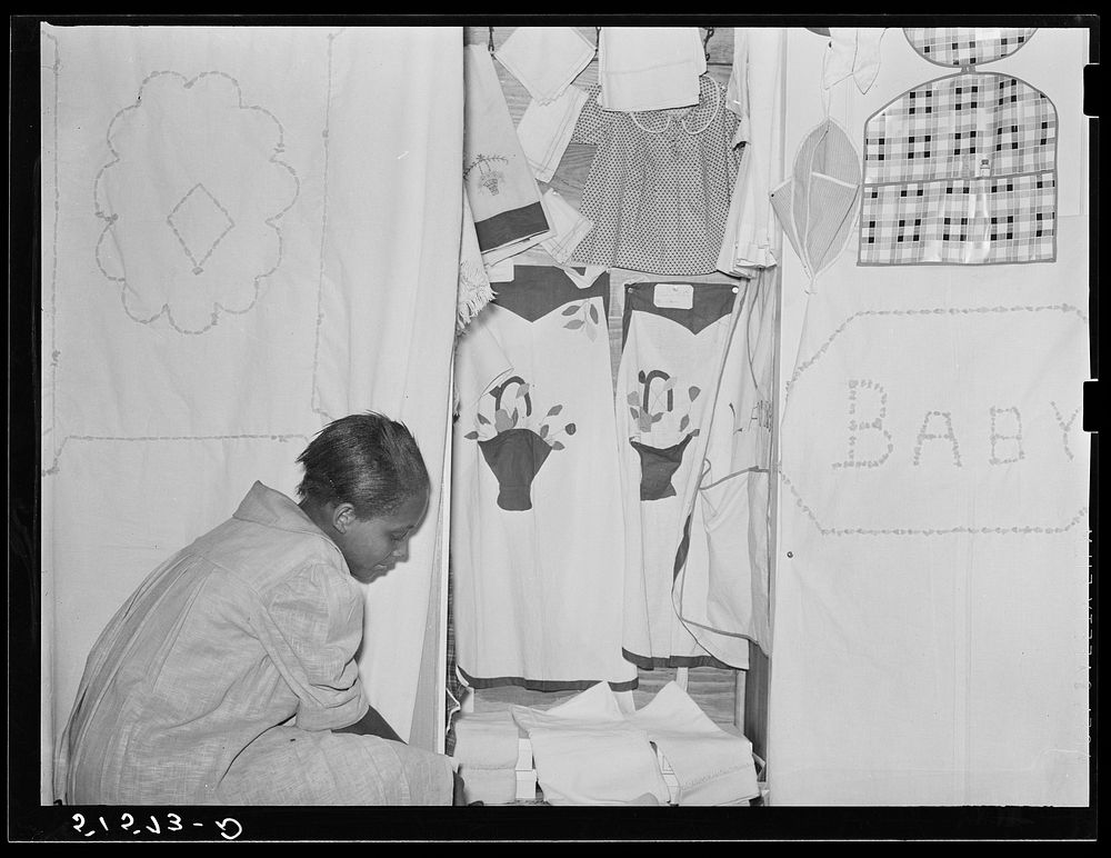 [Untitled photo, possibly related to: A display of sewing and needle work made by NYA (National Youth Administration) girls…