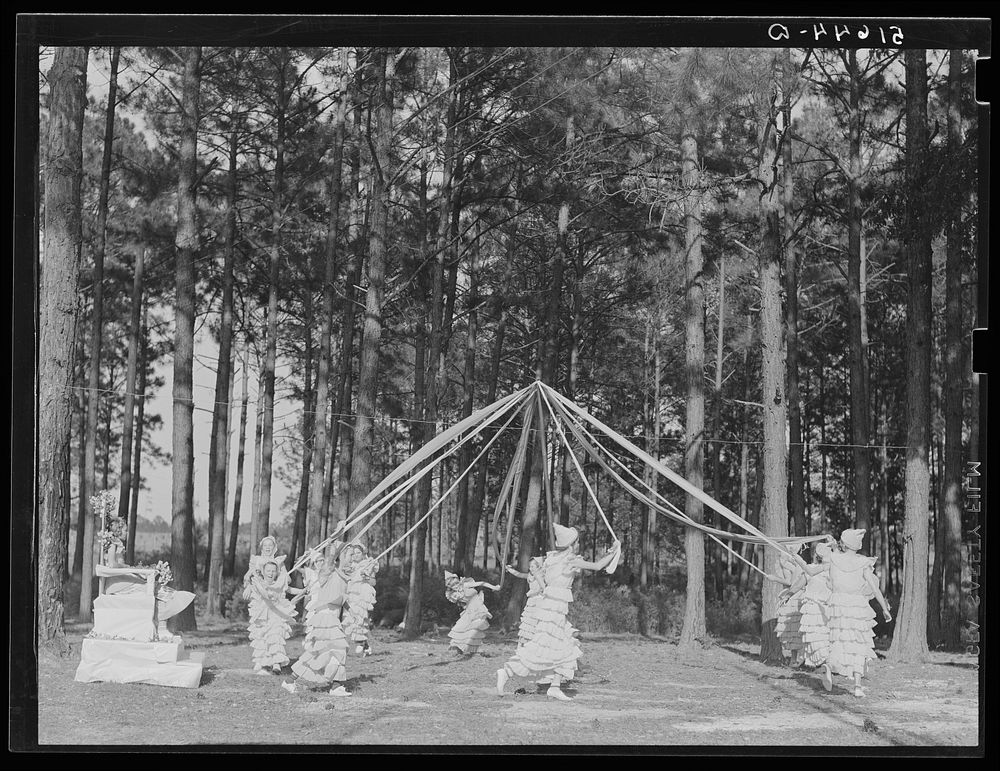 May queen and maypole dance at May Day-Health Day festivities at Irwinville Farms, Georgia. Sourced from the Library of…