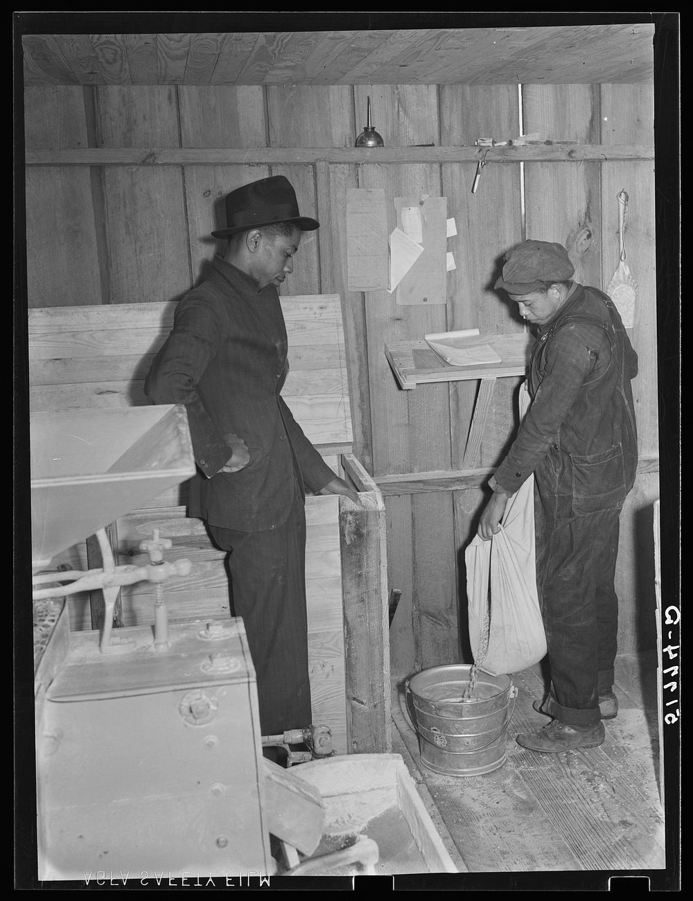 Inside the cooperative grist mill. Prairie Farms, Alabama. Sourced from the Library of Congress.