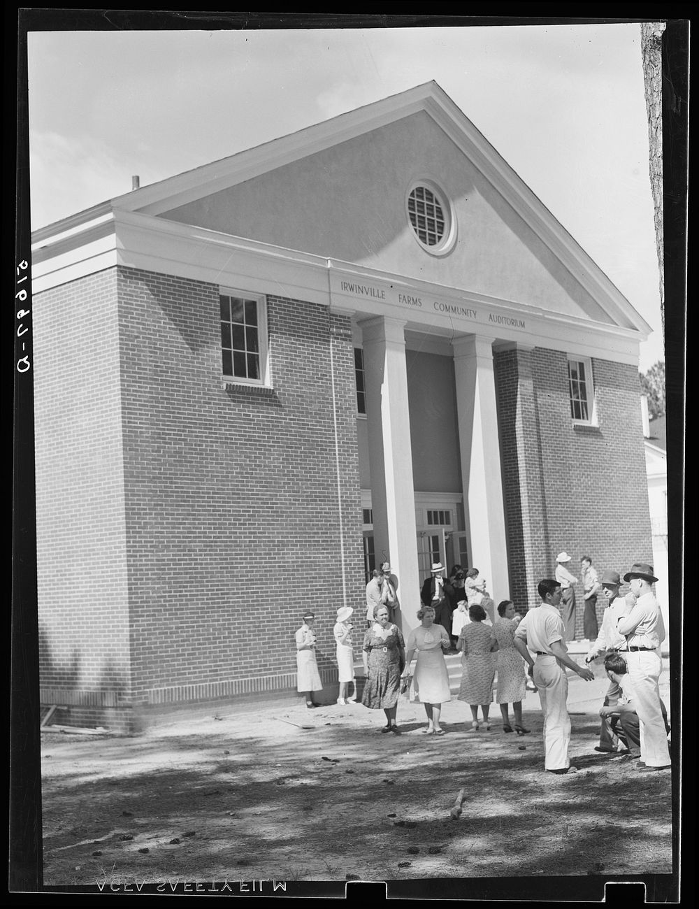 [Untitled photo, possibly related to: Irwinville Farms community auditorium on May Day-Health Day, Georgia]. Sourced from…