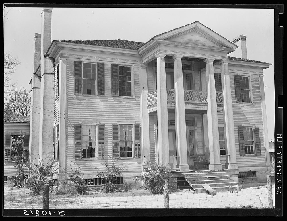 Old home built about 1850 called "Silver Place," owned by Mrs. Frazier, now rented by two families. Alabama. Sourced from…