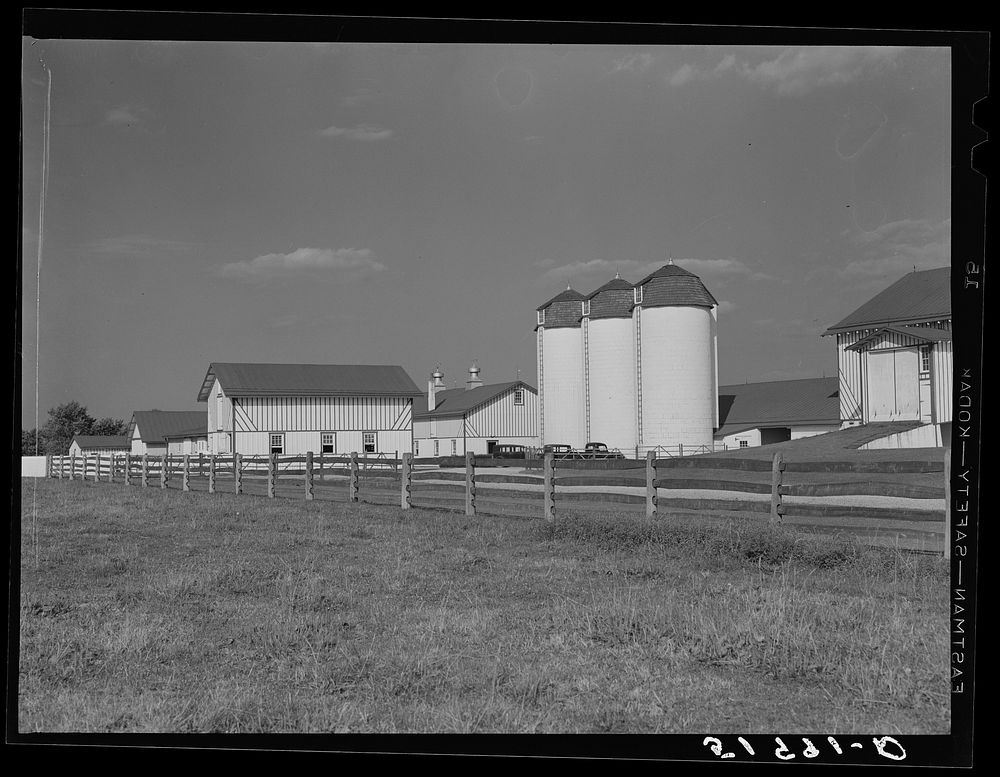 Barn and silos on rich farmland in Bucks County, Pennsylvania. Sourced from the Library of Congress.