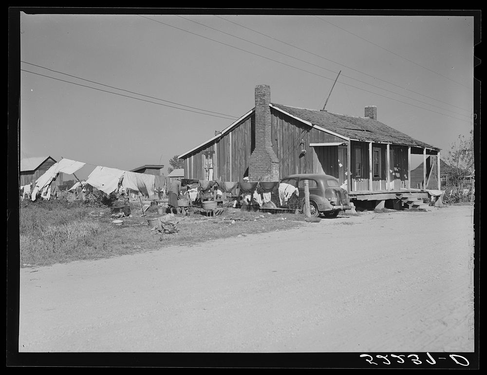 [Untitled photo, possibly related to: One of the tenant houses which has electricity on Marcella Plantation. Mileston…