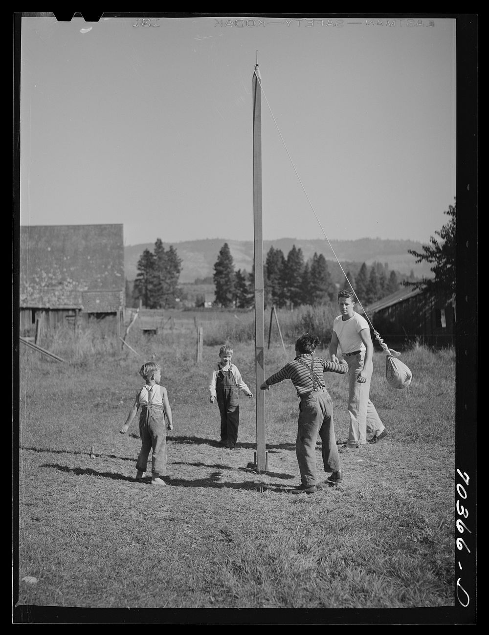 Playtime at the FSA (Farm Security Administration) mobile camp for migratory farm workers. Odell, Oregon by Russell Lee