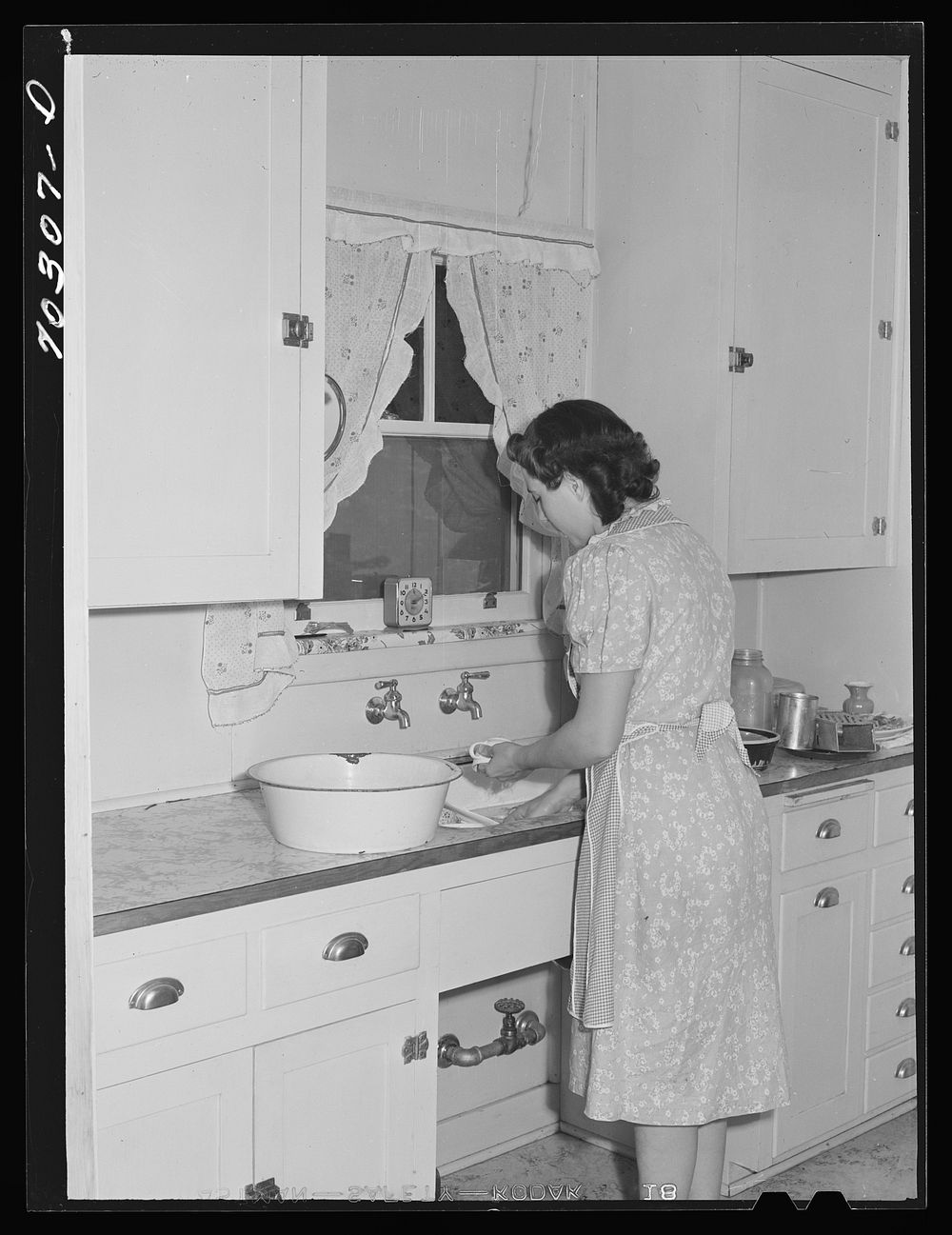 Kitchen in farm home of member of Boundary Farms, FSA (Farm Security Administration) project. Boundary County, Idaho by…