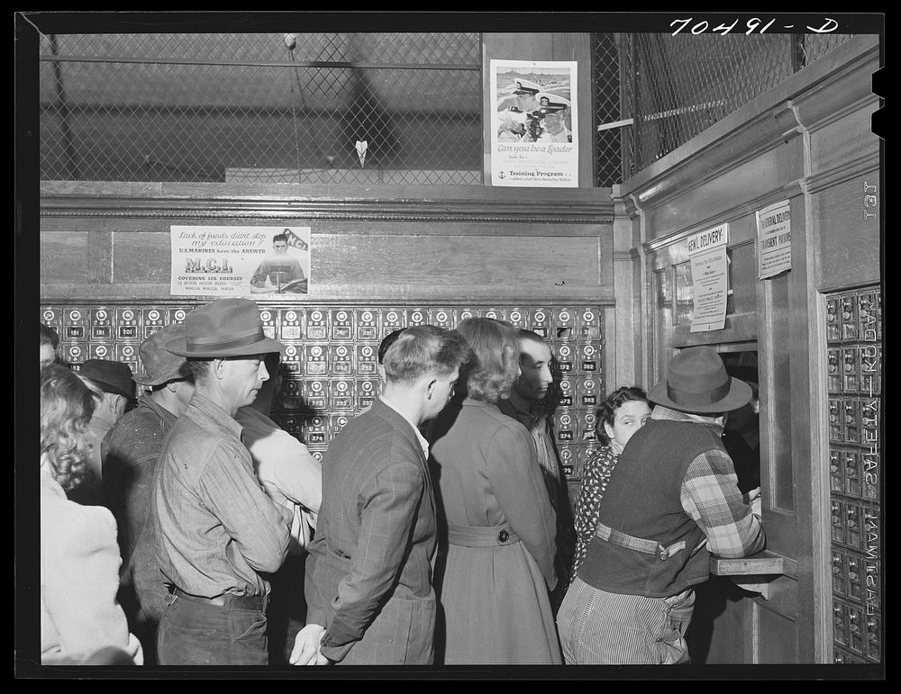 Line up at general delivery window in the post office at Hermiston, Oregon. This post office served about eight hundred…