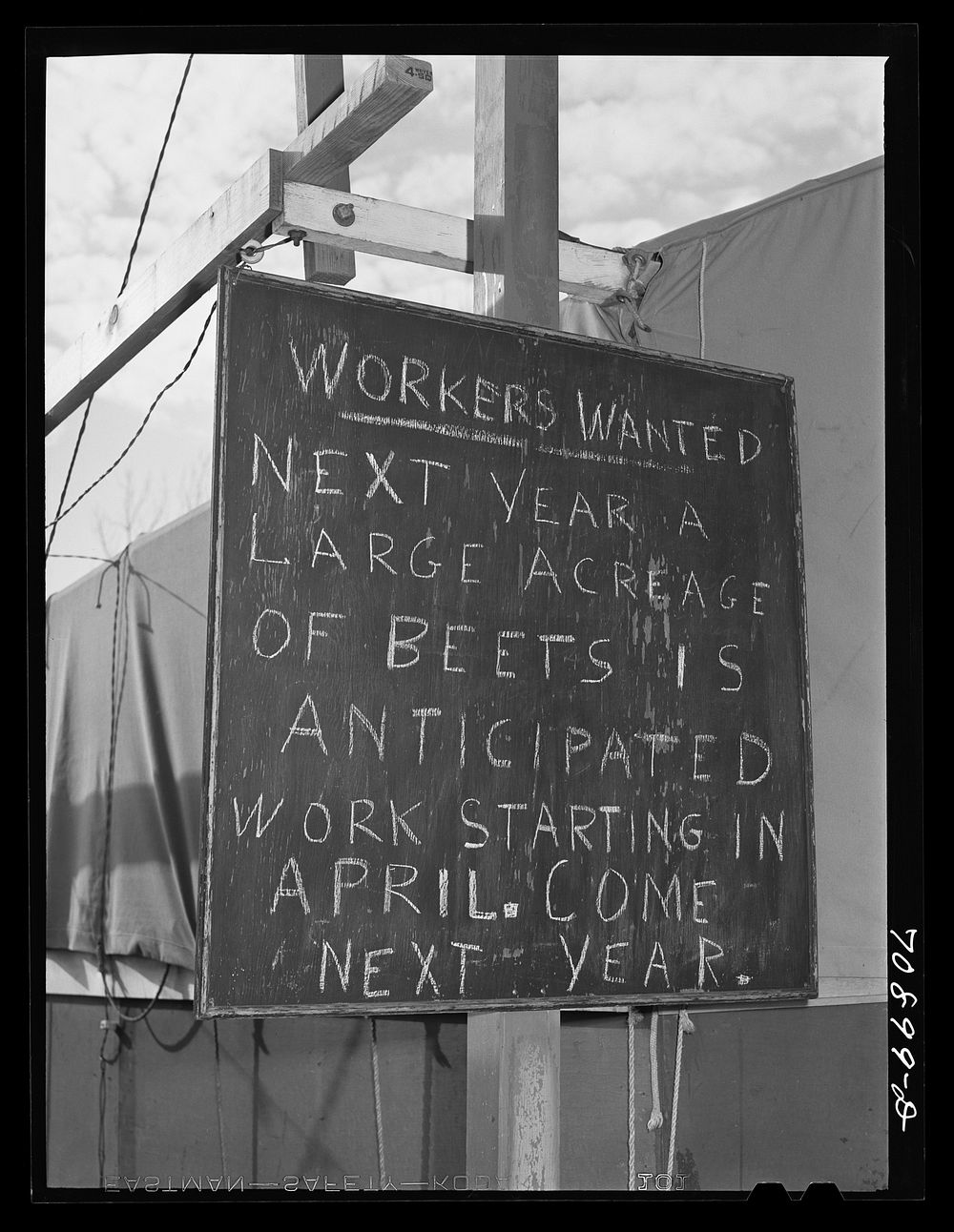 [Untitled photo, possibly related to: Sign at the FSA (Farm Security Administration) mobile camp for farm workers at Wilder…