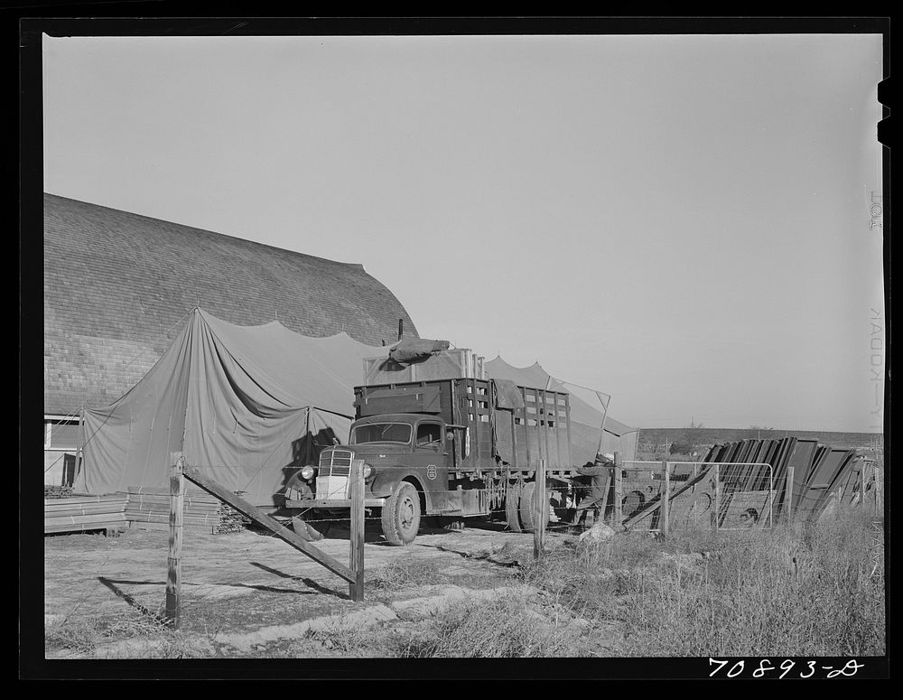 [Untitled photo, possibly related to: Equipment from the FSA (Farm Security Administration) mobile camps arrives at the…