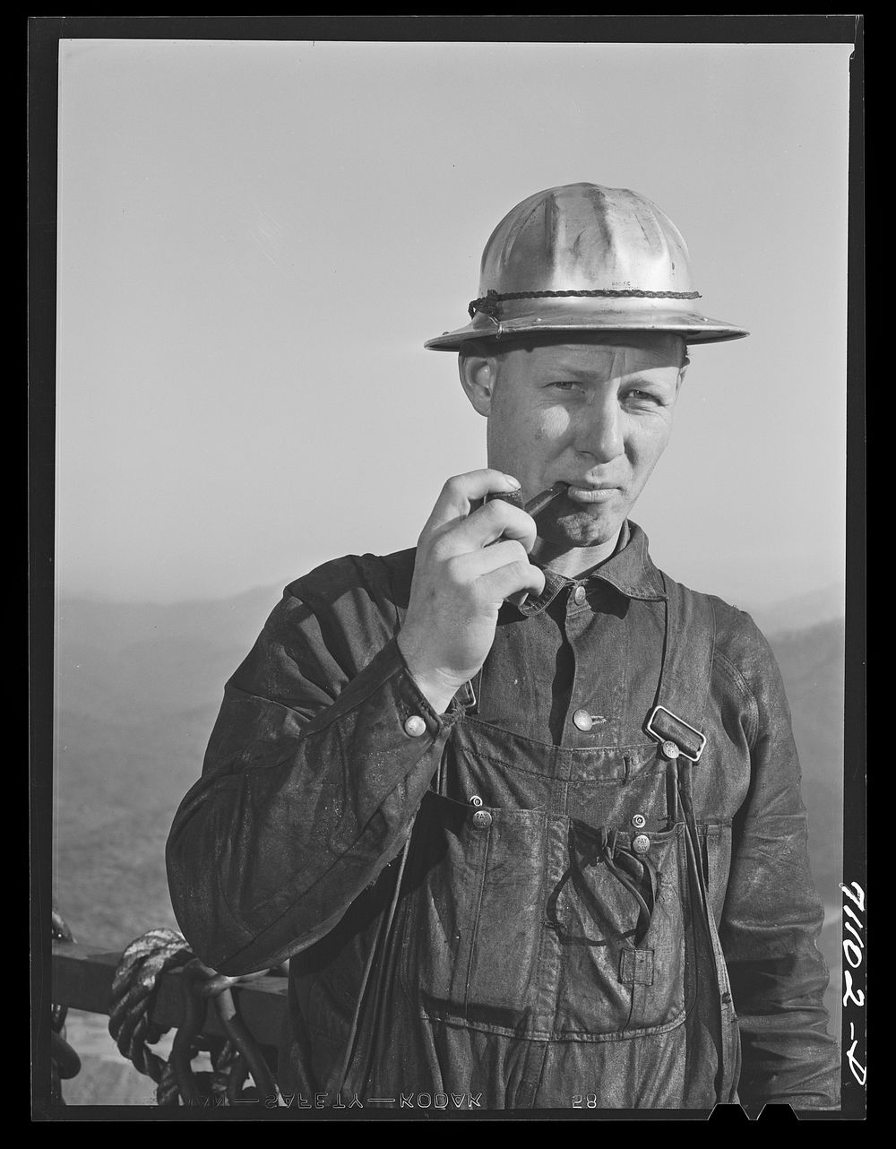 Workman at Shasta Dam. Shasta County, California by Russell Lee