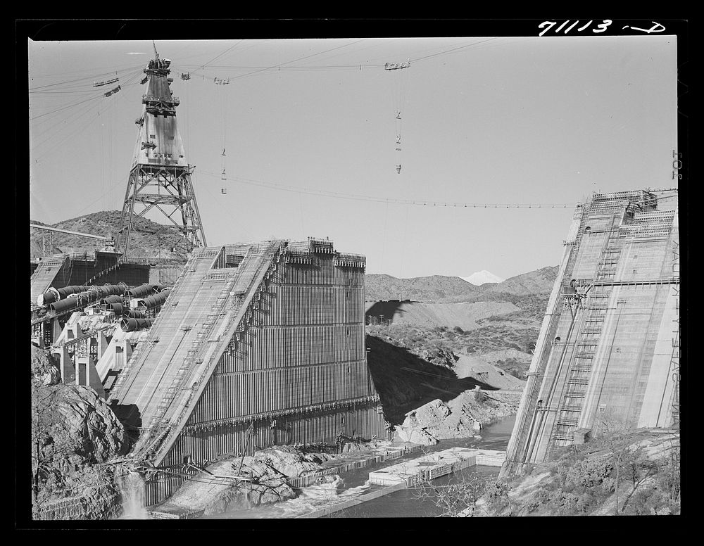 [Untitled photo, possibly related to: Shasta Dam under construction. Mount Shasta in background. Shasta County, California]…