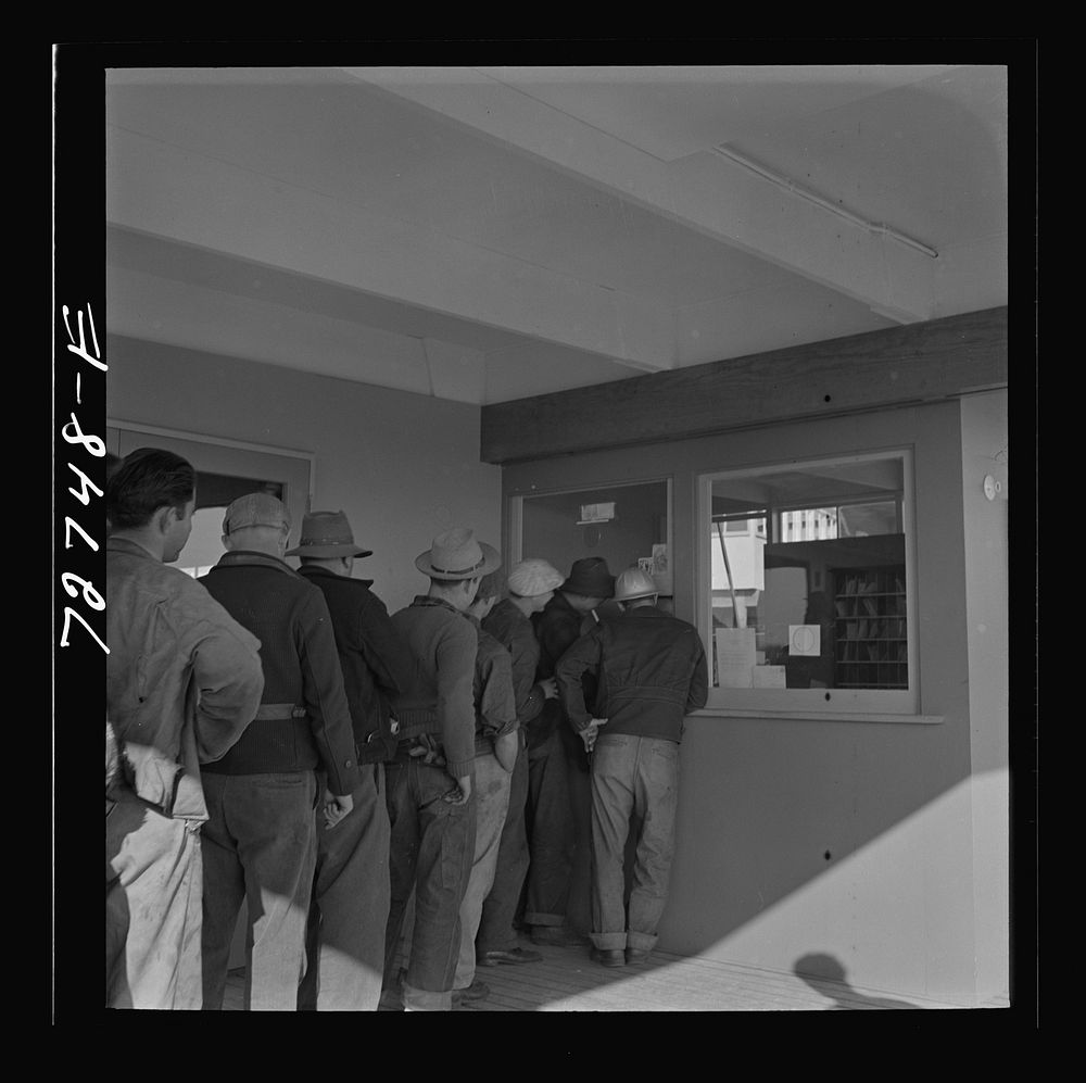 [Untitled photo, possibly related to: Vallejo, California. Workmen from shipyards wait for mail at the FSA (Farm Security…