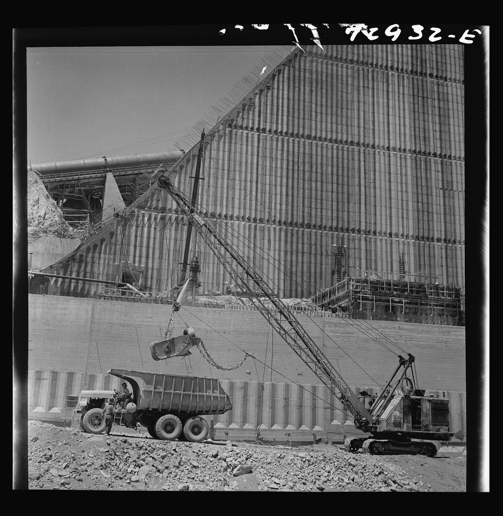 [Untitled photo, possibly related to: Shasta Dam, Shasta County, California. Loading truck with excavated dirt] by Russell…