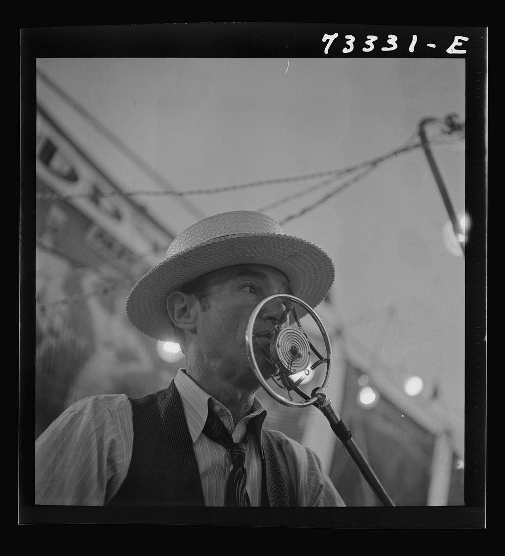 [Untitled photo, possibly related to: Klamath Falls, Oregon. Sideshow barker at the circus] by Russell Lee