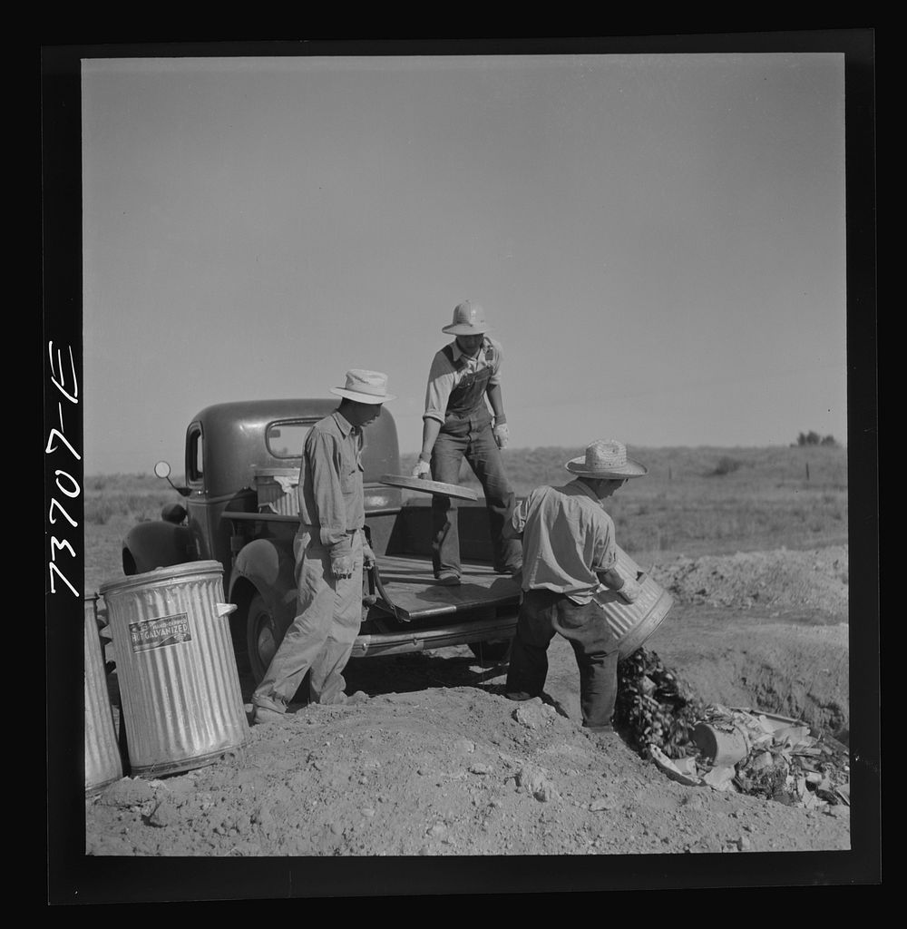 Nyssa, Oregon. FSA (Farm Security Administration) mobile camp. The Japanese-Americans cleaning their camp by Russell Lee