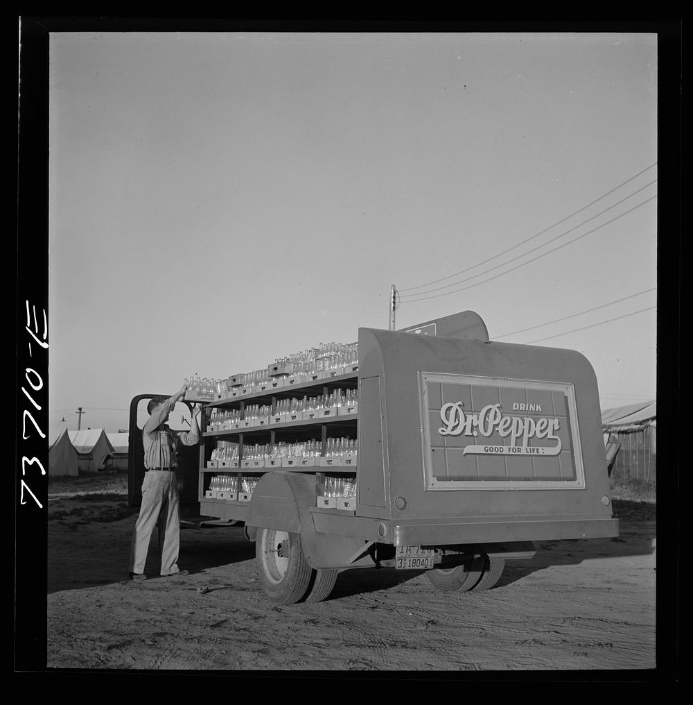 Nyssa, Oregon. FSA (Farm Security Administration) mobile camp. Soda pop is delivered at the camp for Japanese-Americans by…