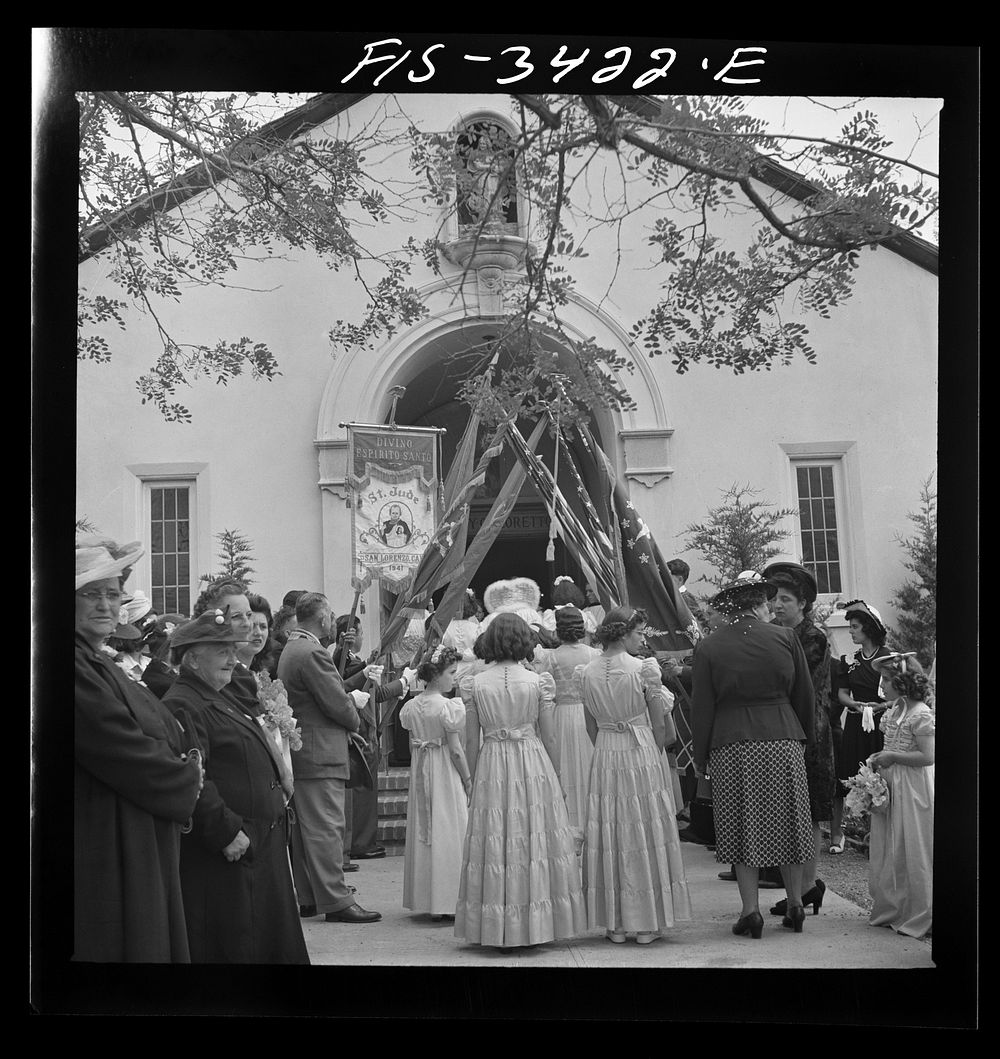 Part of the parade of the Portuguese-American Festival of the Holy Ghost arriving at the church. Novato, California by…